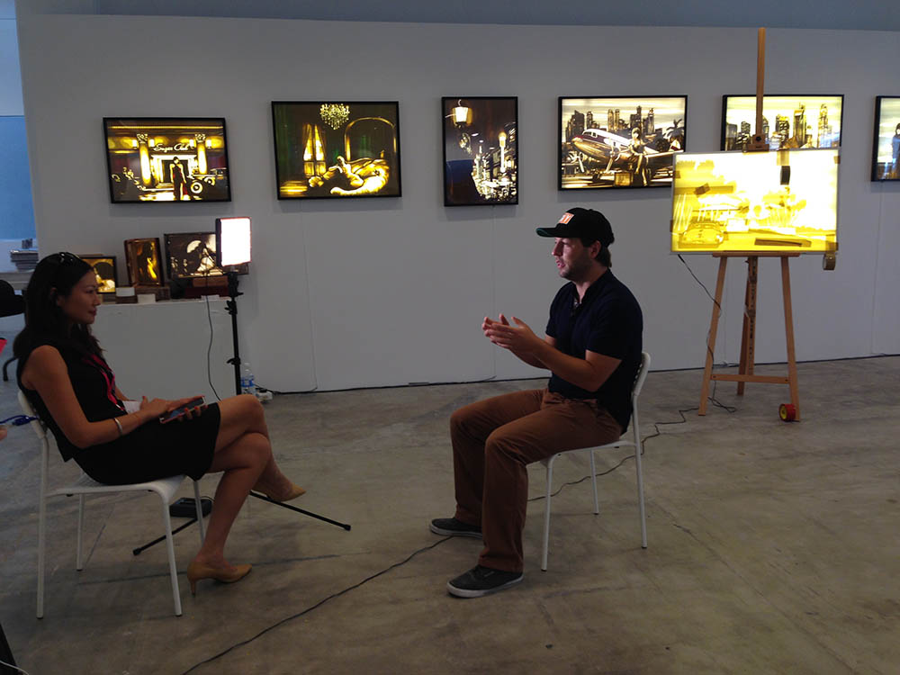 Max Zorn at the Affordable art fair of Singapore, making live tape-art, BBC interview